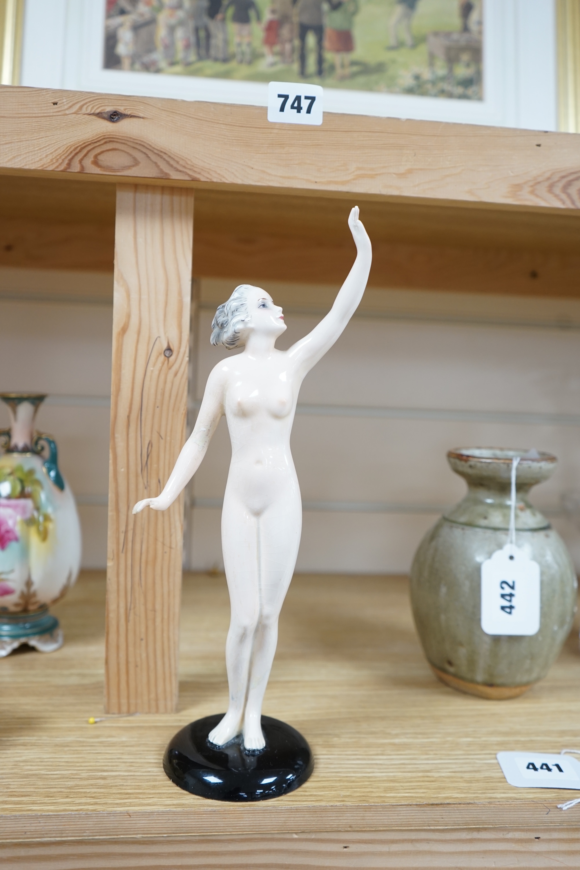 An Art Deco figural nude woman by Goebel, Oeslau Wilhelmsfield, 30cm high. Condition - restored